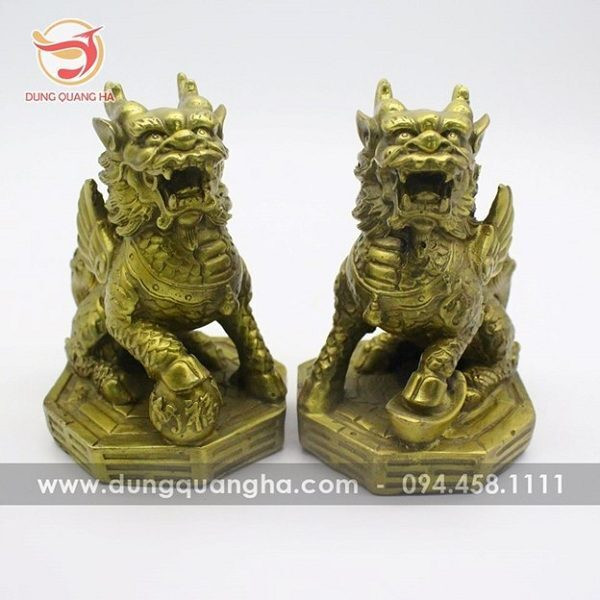 Hình xăm kỳ lân đôi vàng mộc, tượng trưng cho sự thịnh vượng và bảo hộ gia đình