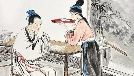 Bàn tay một người thầy tử vi đang chỉ vào lá số, tượng trưng cho quá trình xem tử vi phu thê và luận giải các yếu tố vận mệnh.